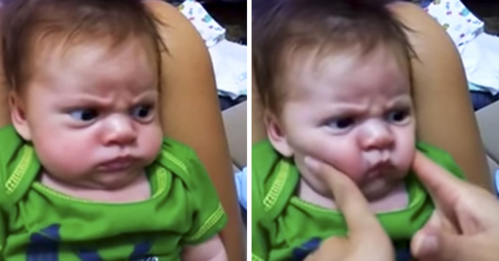 Babyen er skikkelig gretten. Sett hva som skjer når moren tar tak i kinnet?
